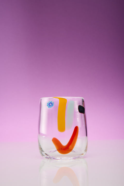 A single face vessel glass cup.