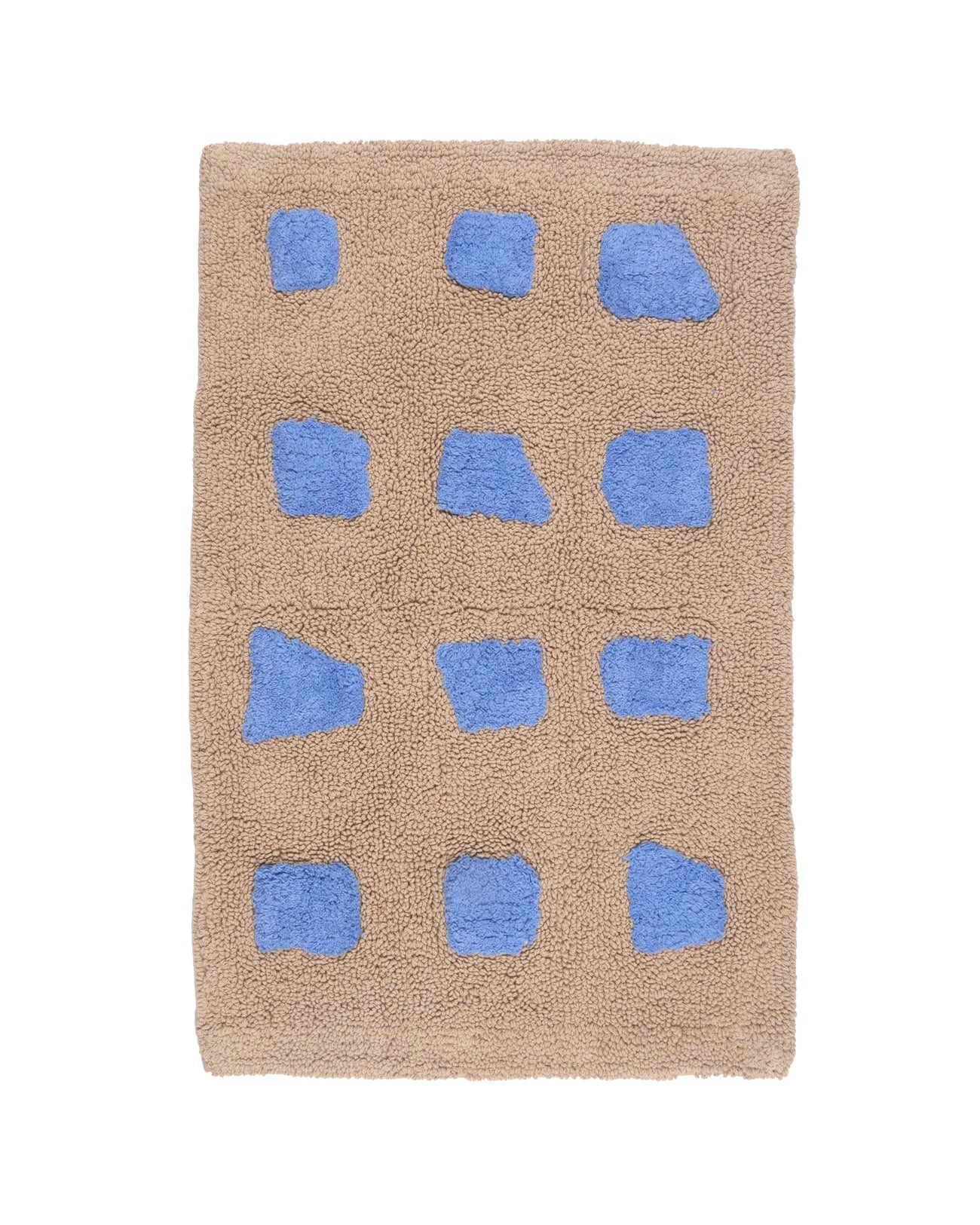Beige bath mat with blue geometric patterns on a white background