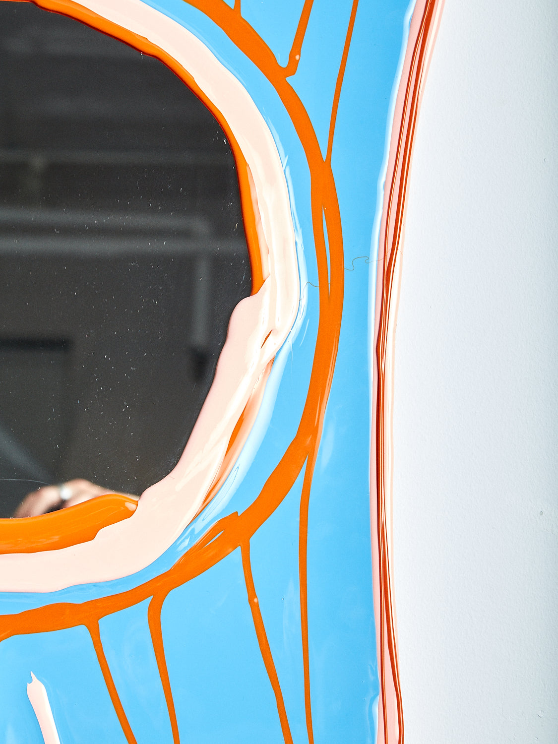 A close up of the Look At Me Mirror in Sky Blue.