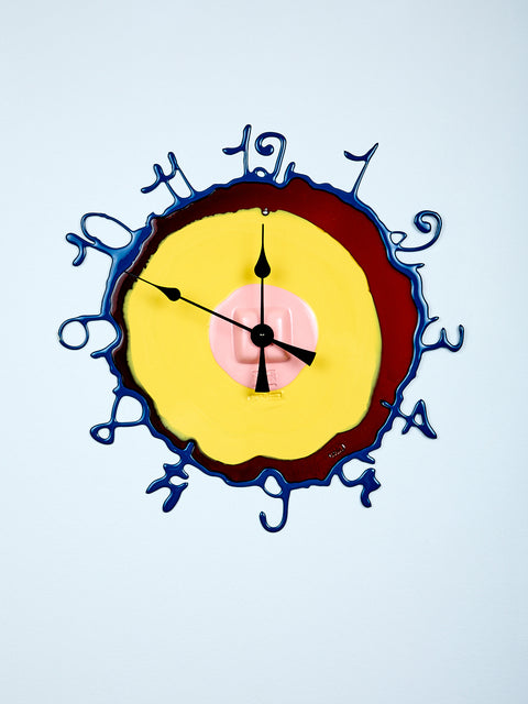 Unique wall clock with abstract design on light white background