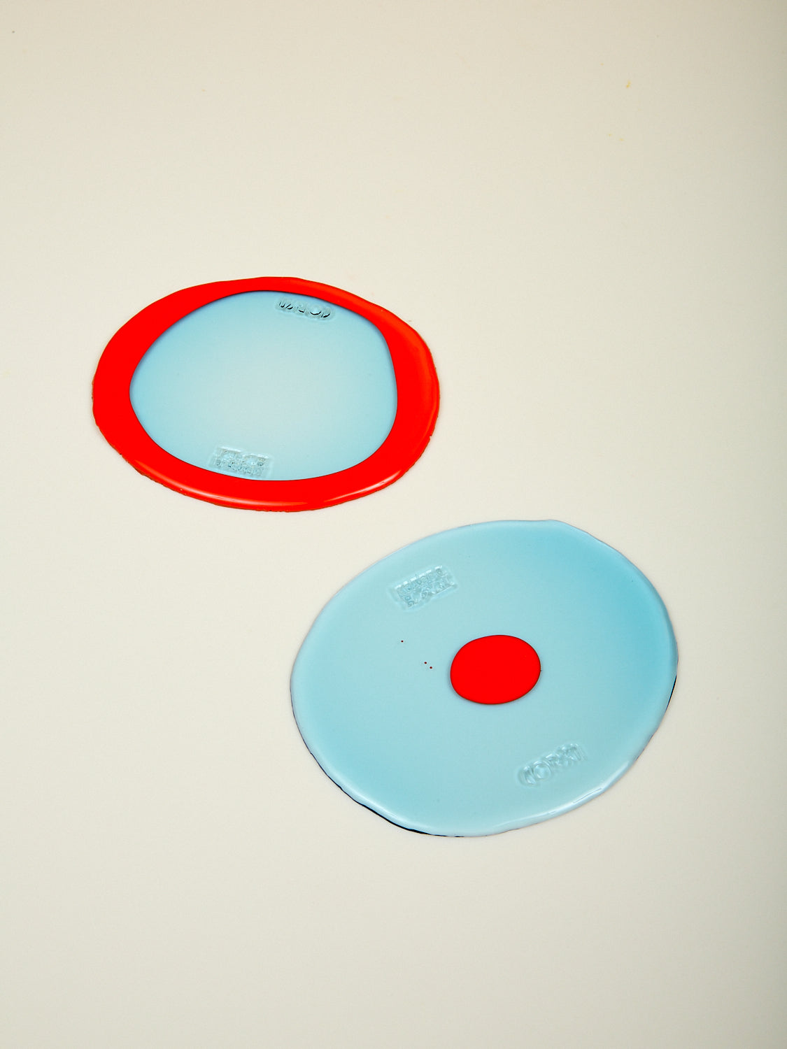  A pair of sky blue and red orange Table-Mates.