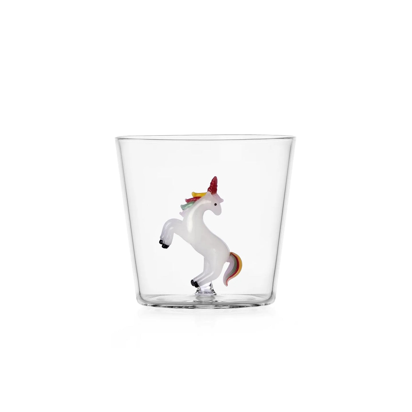 Clear glass with a unicorn figurine on a white background