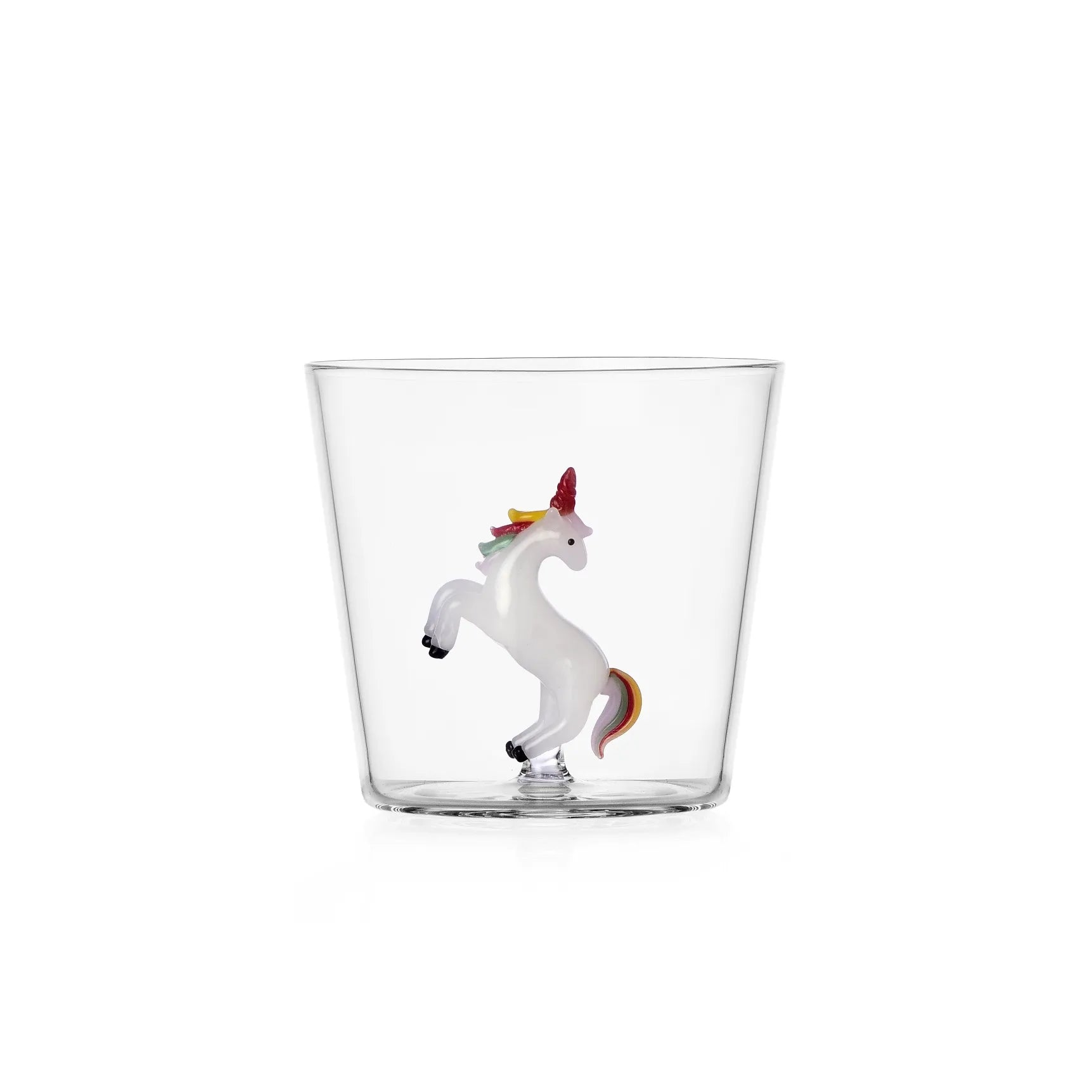 Clear glass with a unicorn figurine on a white background